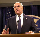 Secretary Powell standing at podium during briefing on Iraq